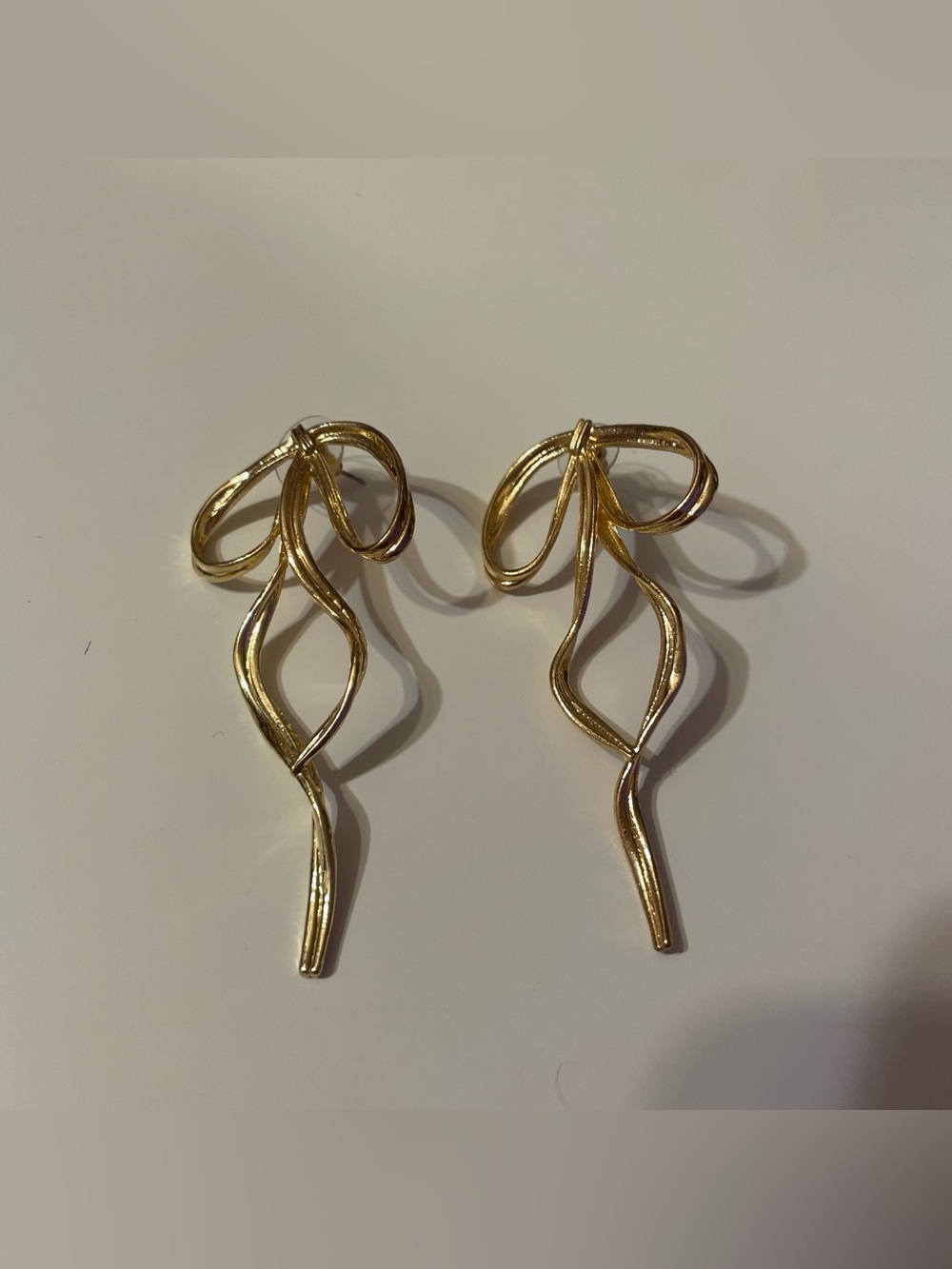 Gold Swirly Bow Earrings